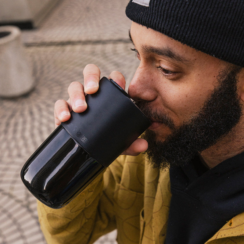 16oz-rise-tumbler-x8 16oz_rise_tumbler_black_man_drink_square.jpg