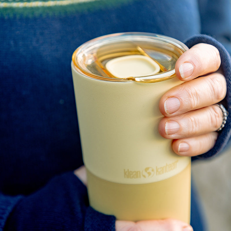 16oz-rise-tumbler-x8 16oz_rise_tumbler_wax_yellow_closeup_hand_lid_square.jpg