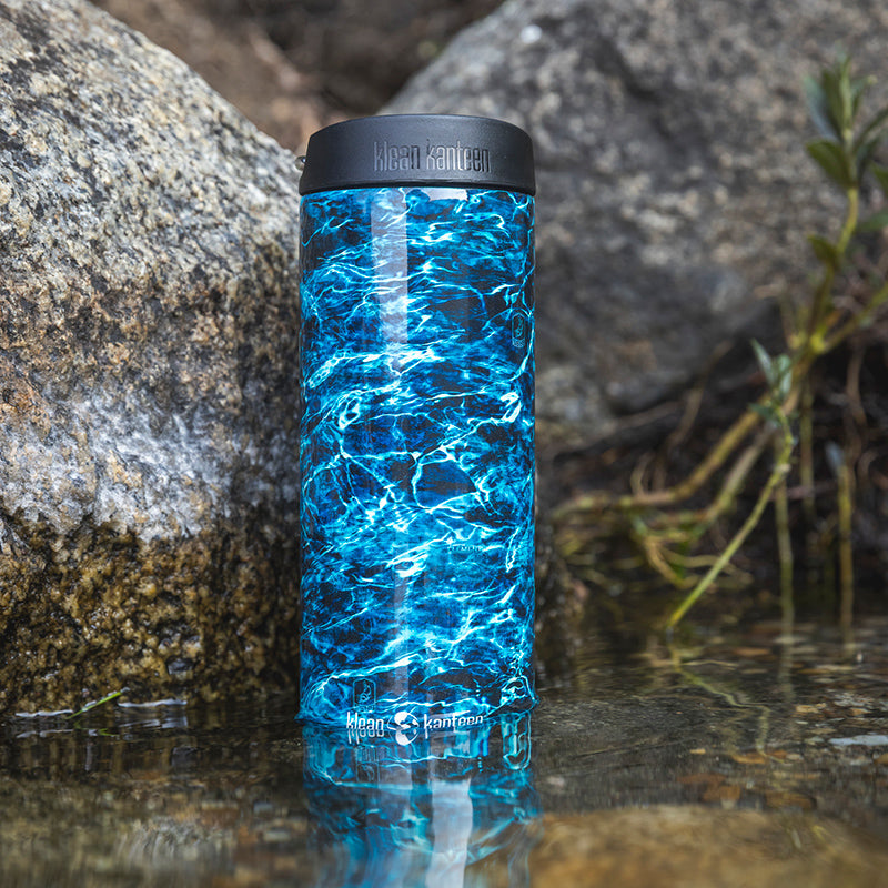20oz-tkwide-with-cafe-cap-mossy-oak-a4 16oz_tumbler_mossyoak_bass_cafe_water_closeup_square.jpg