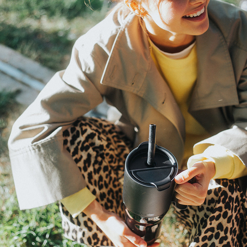 26oz-rise-tumbler-with-straw-lid-i7 26oz_rise_tumbler_black_woman_topview_square.jpg