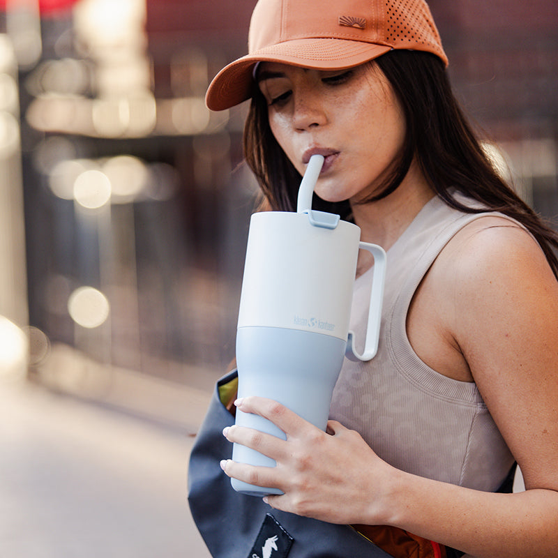 36oz-rise-tumbler-with-straw-lid-i1 36oz_rise_tumbler_straw_girl_sip_square.jpg