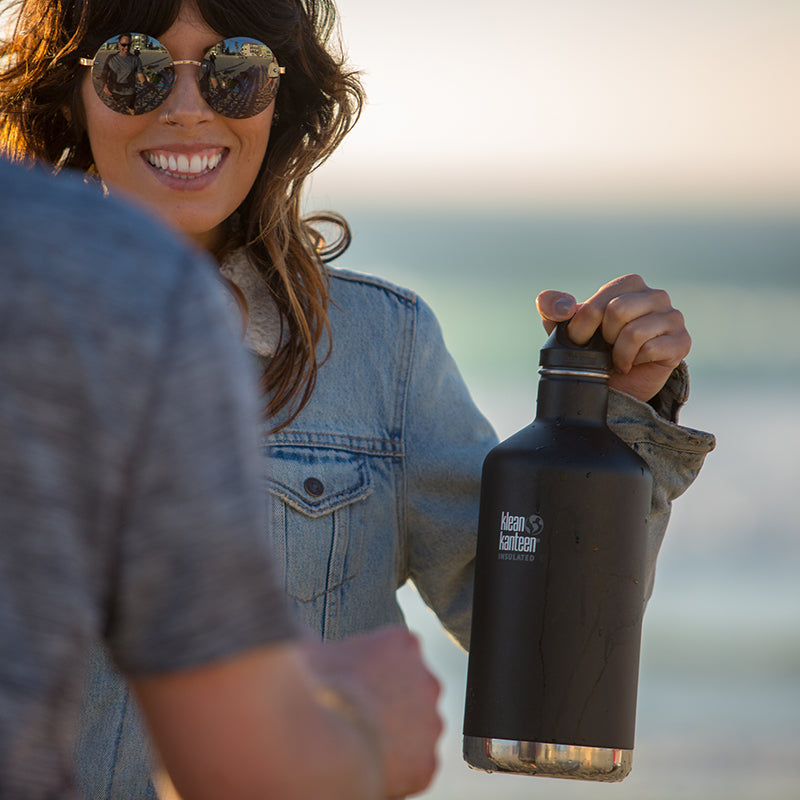64oz-classic-with-loop-cap-a2 64oz_insulated_classic_black_beach_girl_hand_square.jpg