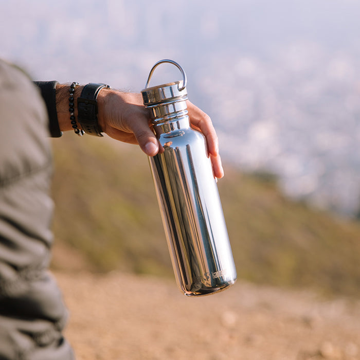 27oz-reflect-with-bamboo-cap-j7 K27SSLRF-MS-BAMBOO_reflect_bottle_hand_lifestyle.jpg