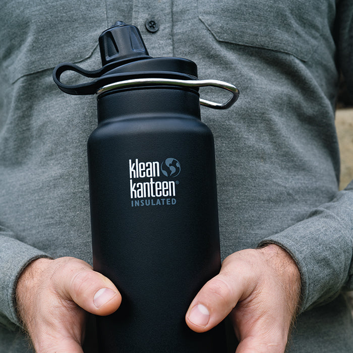 tkwide-chug-cap-l9 K32TKWSSL-SB-Craddled-Bottle_closeup_lifestyle.jpg